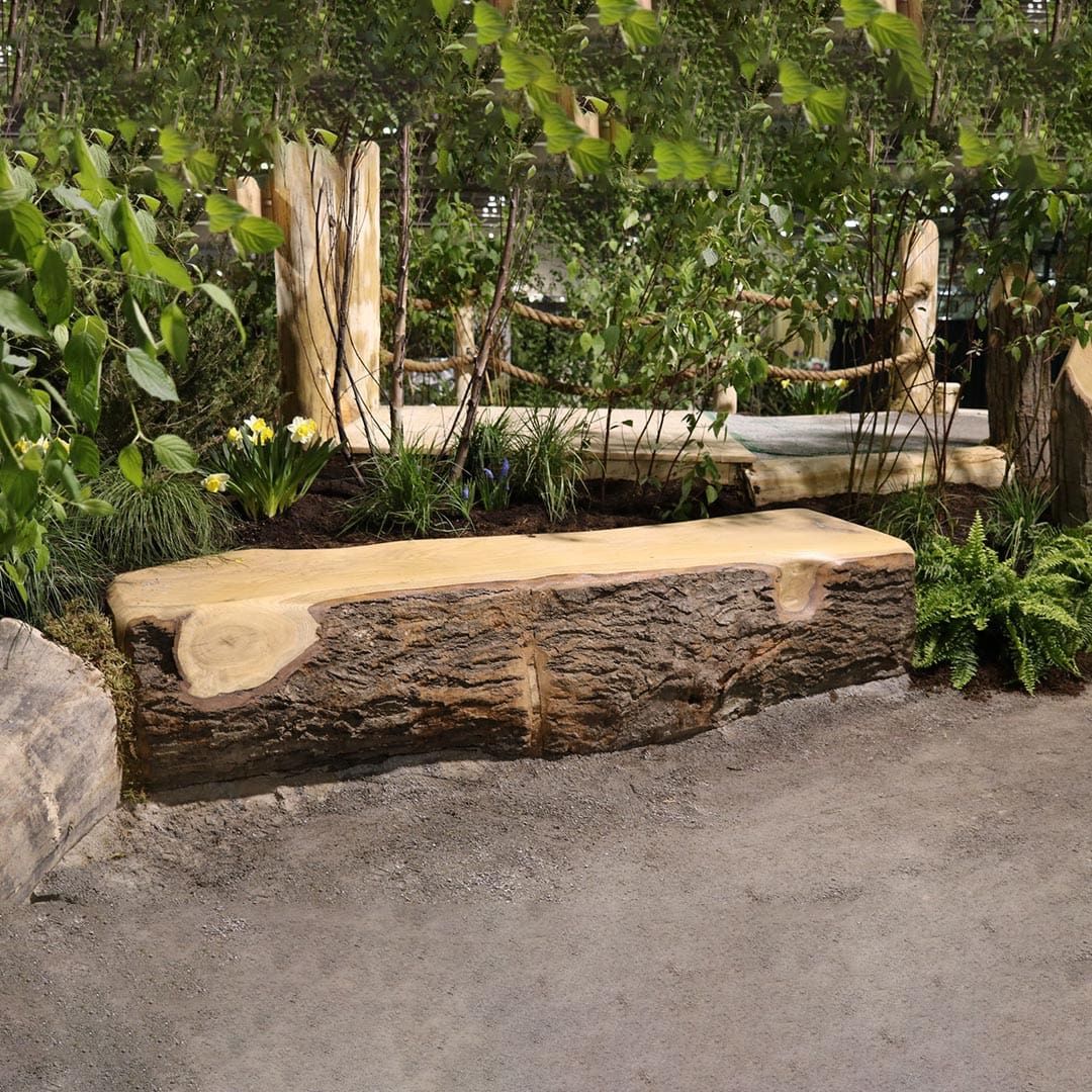 Nature's Instruments log bench outdoor seating